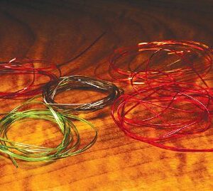 A group of colorful string on the floor.