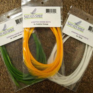Three packages of colored tubing are on the floor.