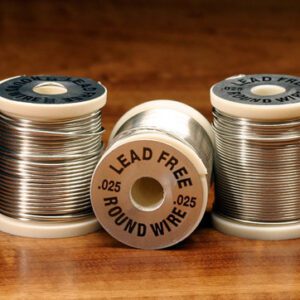 A group of three metal wire spools on top of a table.