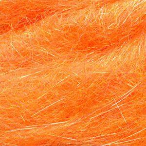 A close up of orange yarn with long strands