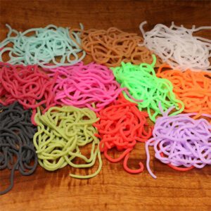 A table with many different colored rubber bands